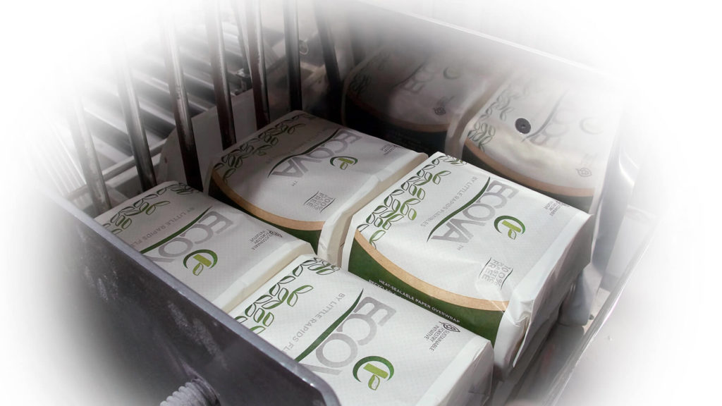Collated finished packs using Ecova paper overwrap inside Infinity cascepacker